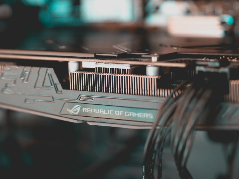 Close-up of a graphics card showing a power cable