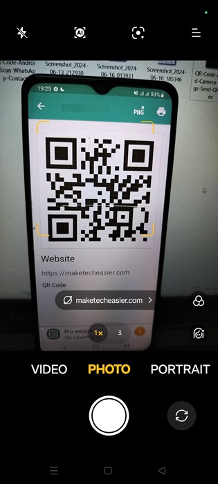 Putting a phone camera on top of another phone's screen to scan its QR code.
