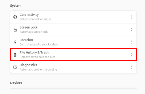 A screenshot highlighting the "File History & Trash" settings on the System Settings menu.