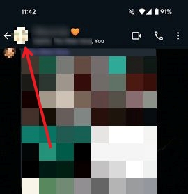 Tapping on group profile image in WhatsApp on Android.