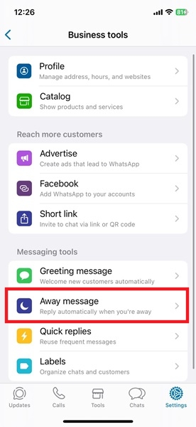 Tapping on "Away message" option in WhatsApp Business.