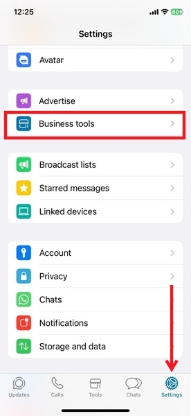 Selecting "Business tools" option in WhatsApp Business.