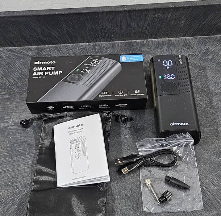 Airmoto air pump with case and accessories.