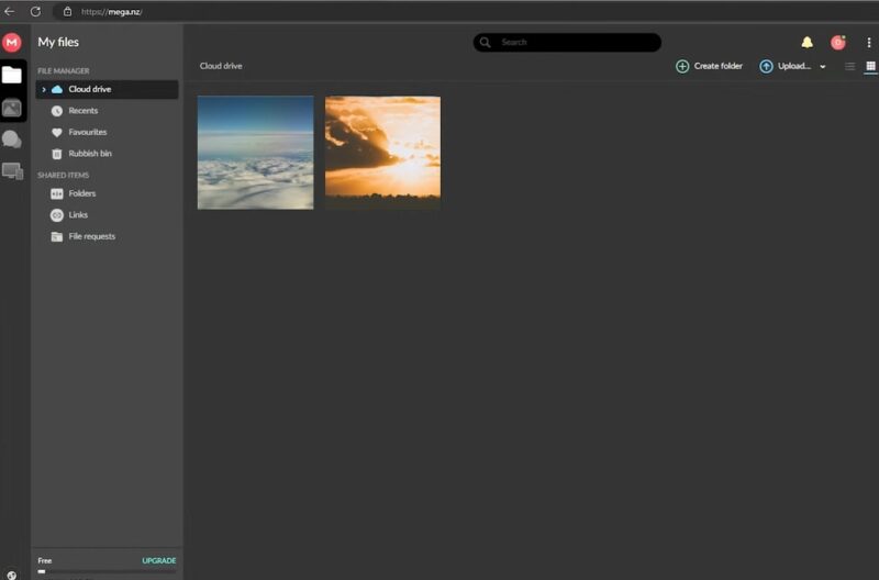 Uploading files on MEGA's web interface.