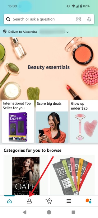 Tapping on person-like icon in Amazon Shopping app on Android.