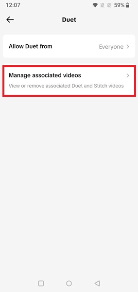Tapping on "Manage associated videos" option in TikTok app,