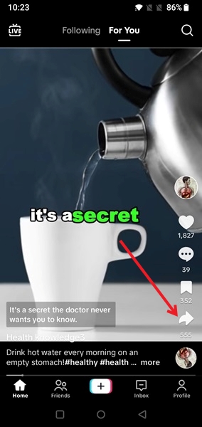 Tapping on Share button in TikTok app. 
