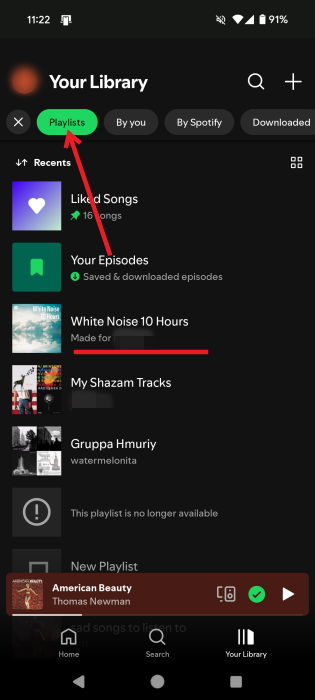 Switching to Playlists in the Spotify app for Android and selecting a playlist.