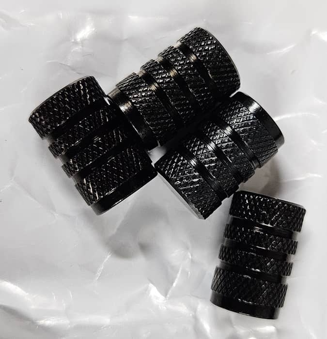 Bonus valve caps included with tire inflator.