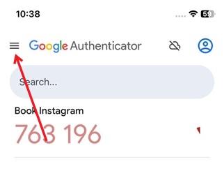 Tapping on hamburger menu in Google Authenticator app on old device.