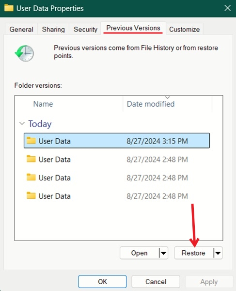 Restoring a folder's previous version in File Explorer. 