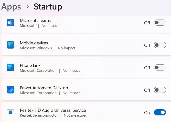 Disabling most Startup apps except Realtek in Windows 11.