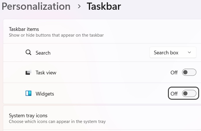 Disabling the Widgets option in Taskbar settings.