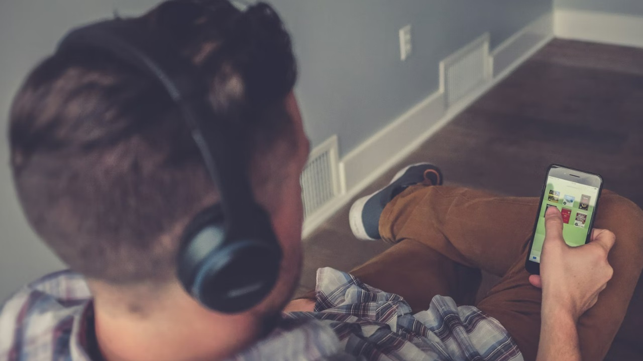 Man listening to audiobooks.