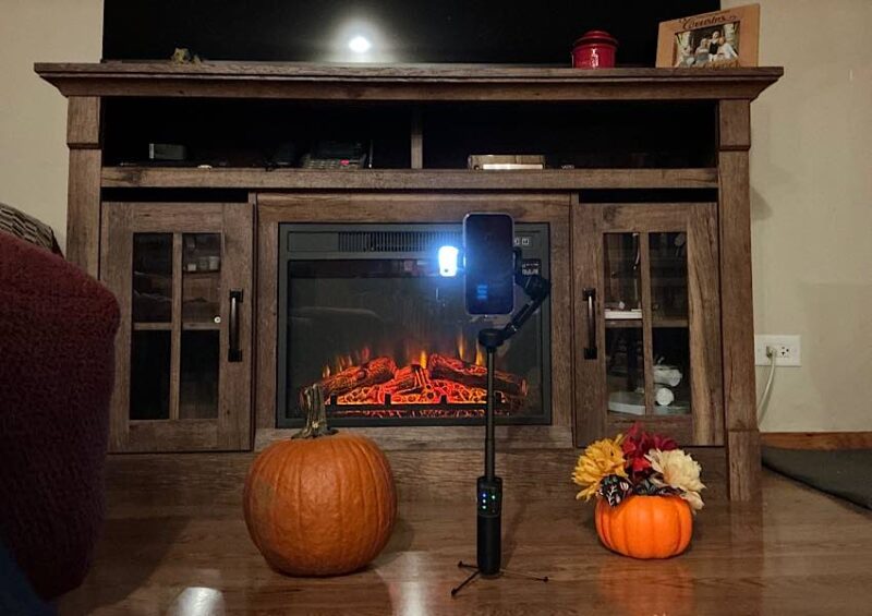 Tripod near fireplace