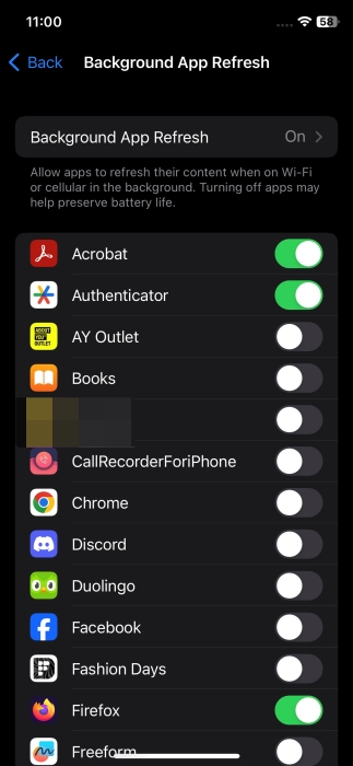 Disabling background app refresh option for select apps on iPhone.