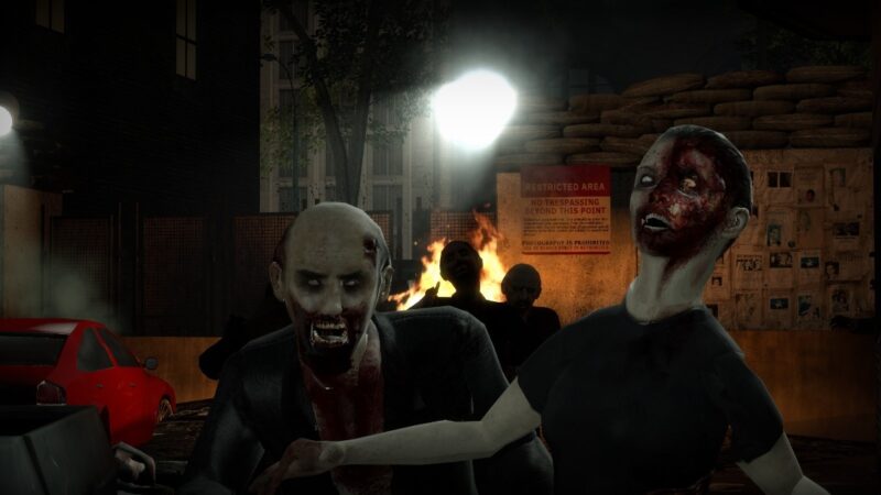 A screenshot from the game No More Room in Hell, showing two zombies while an alley burns behind them.