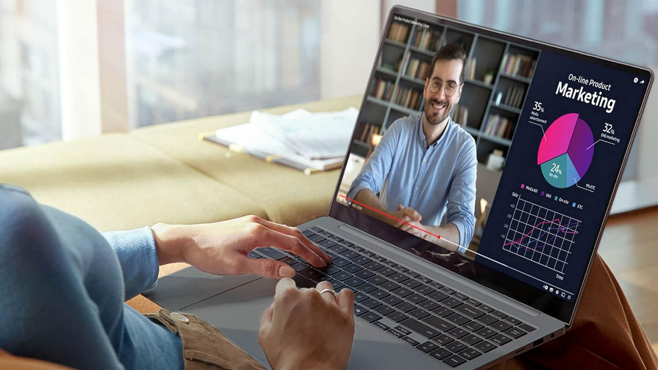 Person Working On Samsung Galaxy Book4