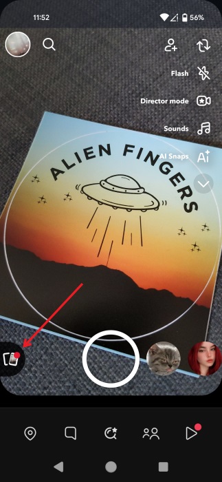 Tapping on cards icon in Snapchat camera.