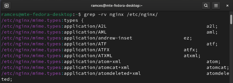 A terminal showing Grep's invert flag that matches everything but the target string.