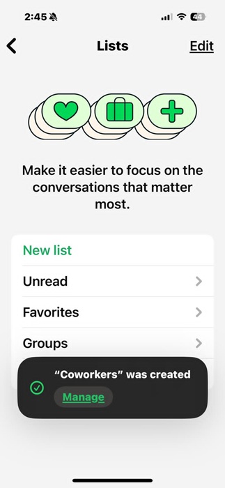 A new list called "Coworkers" is created under the default WhatsApp lists on an iPhone.