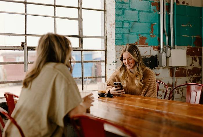 Australia Social Media Ban Children Girl At Table With Phone