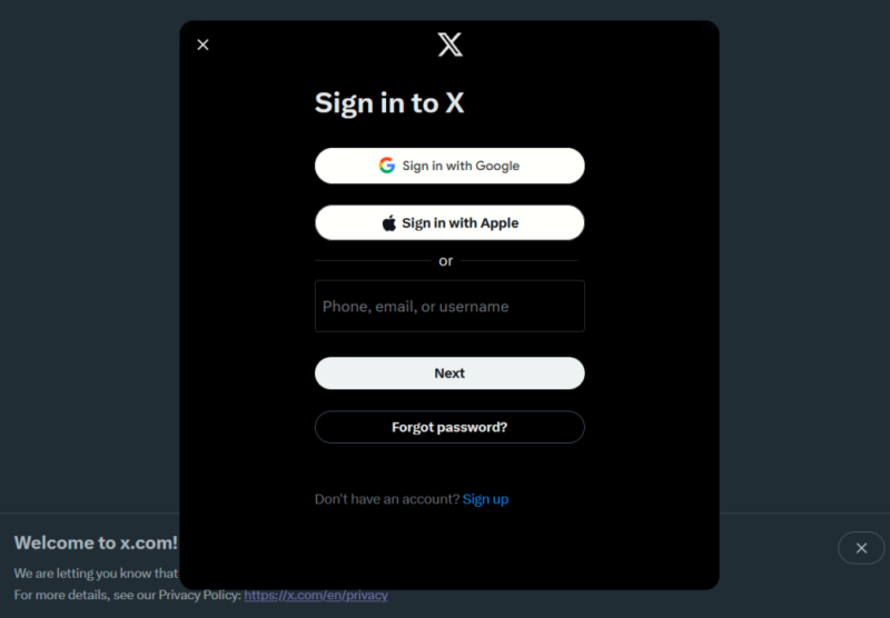 Click on the "Sign in" button in Twitter on PC.