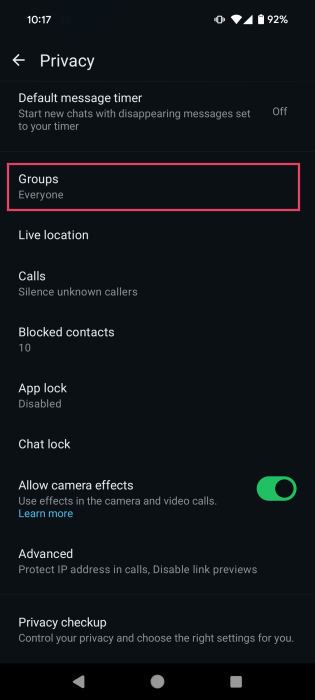 Tapping on Groups option in WhatsApp Privacy section on Android phone.