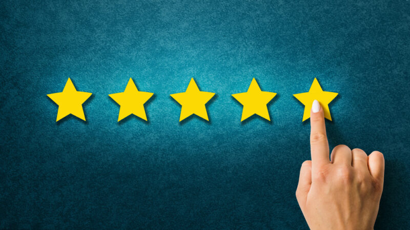 5 yellow stars with a pointing finger