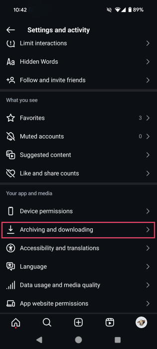 Tapping on "Archiving and downloading" option in Instagram app Settings.