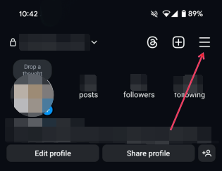Pressing on hamburger menu on Instagram profile page. 