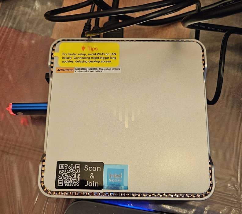 Multiple items connected to the Kamrui mini PC.