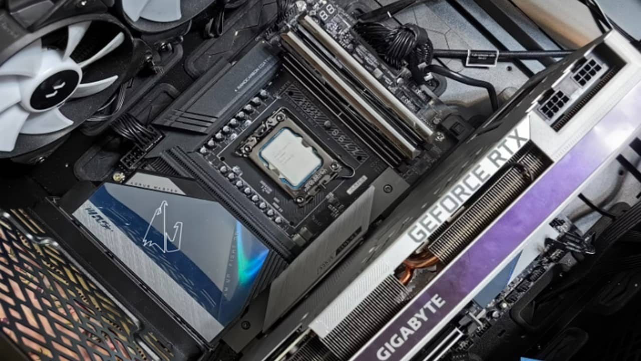 Open PC with various components.