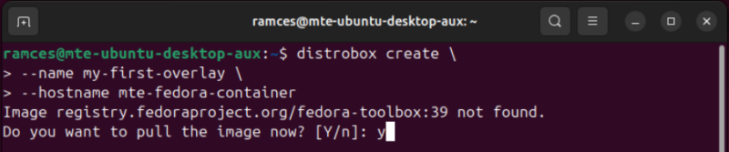 A terminal showing the confirmation prompt for creating a new Distrobox instance.