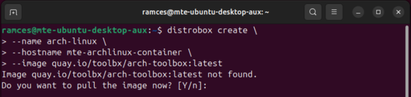 A terminal showing the process of creating an Arch Linux Docker container.