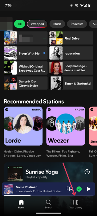 Tapping on "Your Library" option in Spotify app. 
