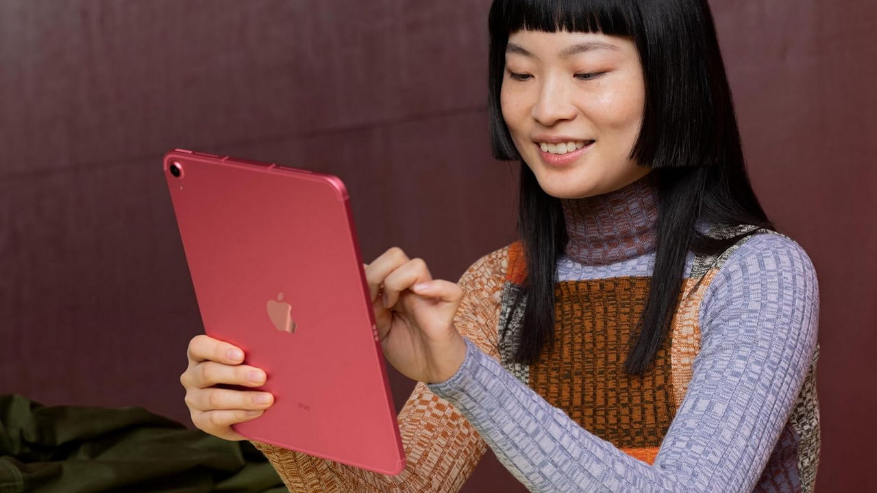 Woman Using 10 Generation Ipad