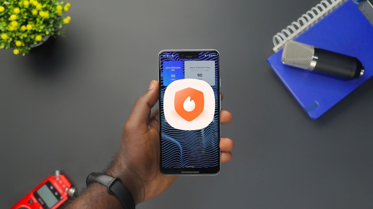 Man Holding Android Phone and Installing Best Firewall App