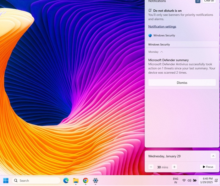 Enabling "Do not disturb" in Notifications settings on the taskbar.