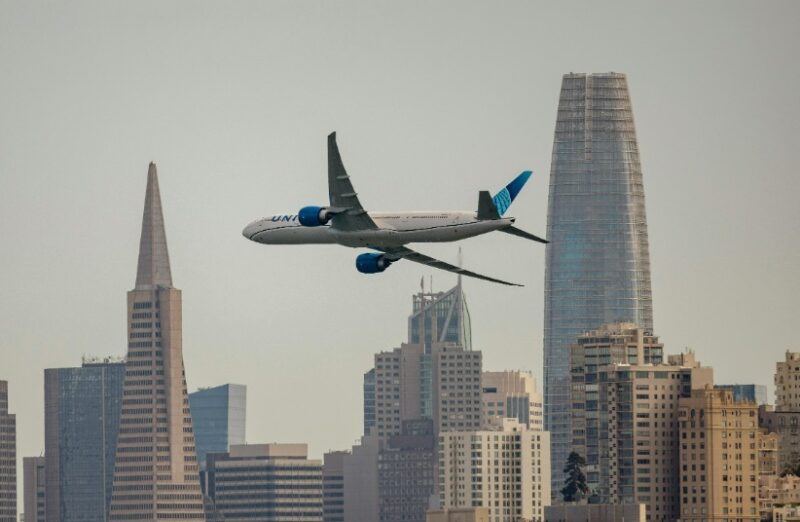 United plane flying over San Francisco.