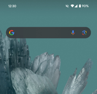 Dark Google Search bar view on Android homescreen. 