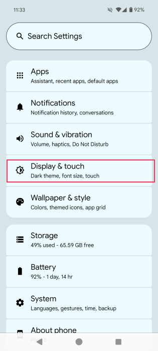 Tapping on "Display & touch" option in Android Settings. 