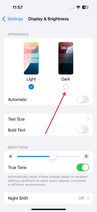 Switching to Dark mode in iPhone Settings. 