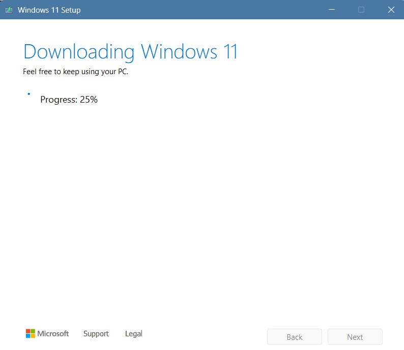 Windows 11 downloading on device using a Media Creation Tool for USB.