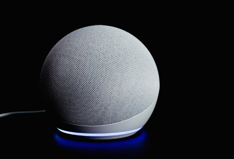 Amazon Echo on black background.