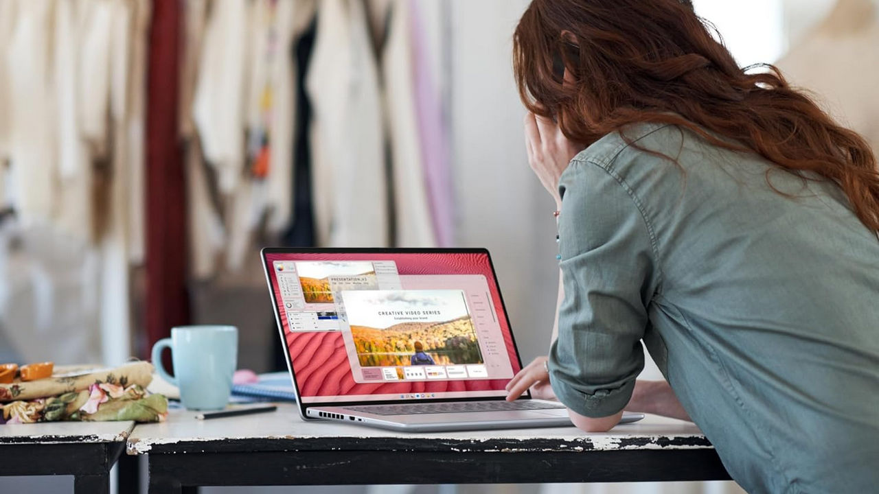 Woman Working On Inspiron 16 Laptop