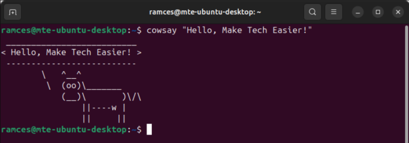 A terminal showing the default cowsay prompt.