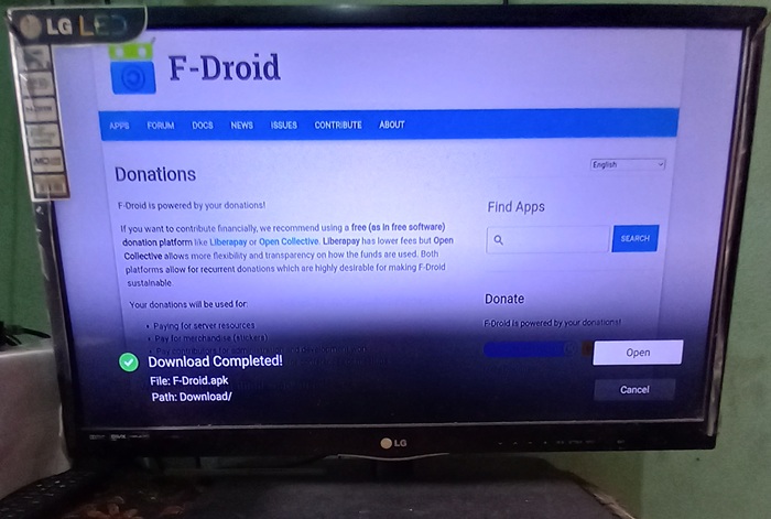 Downloading F-Droid's APK on an Android smart television.