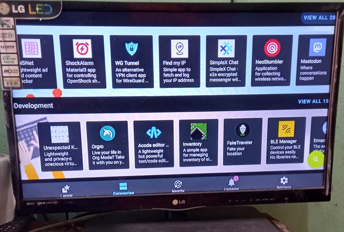 Various non-Google apps displayed for F-Droid on a smart TV screen.
