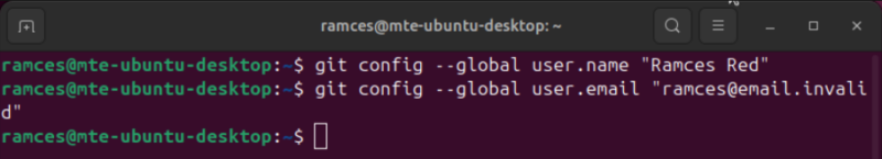 A terminal showing the commands to set the username and email in Git.
